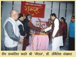 Lighting the lamp Shri Niraj and Urmilesh Shankkhader